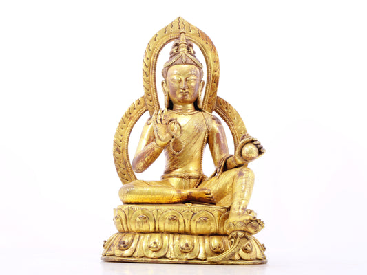 A solemn gilt bronze statue of Tara