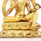 A solemn gilt bronze statue of Tara