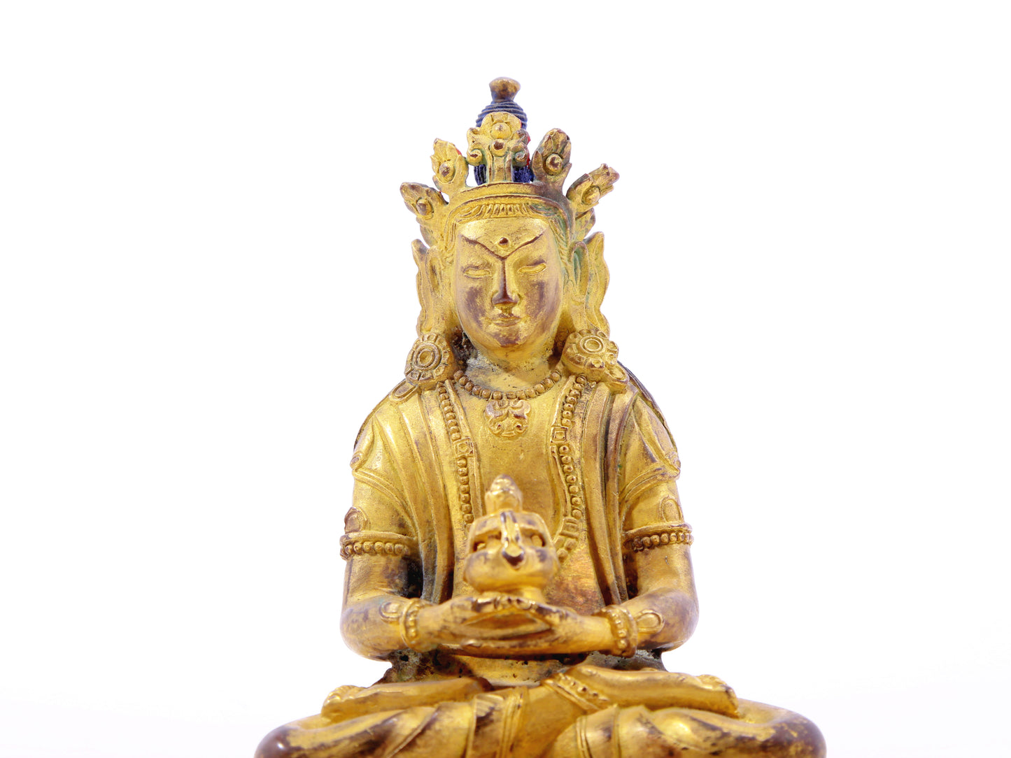 A serene gilt bronze statue of Amitayus Buddha