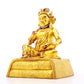 A serene gilt bronze statue of the God of Wealth