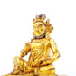 A serene gilt bronze statue of the God of Wealth