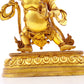 A serene gilt bronze Vajra statue