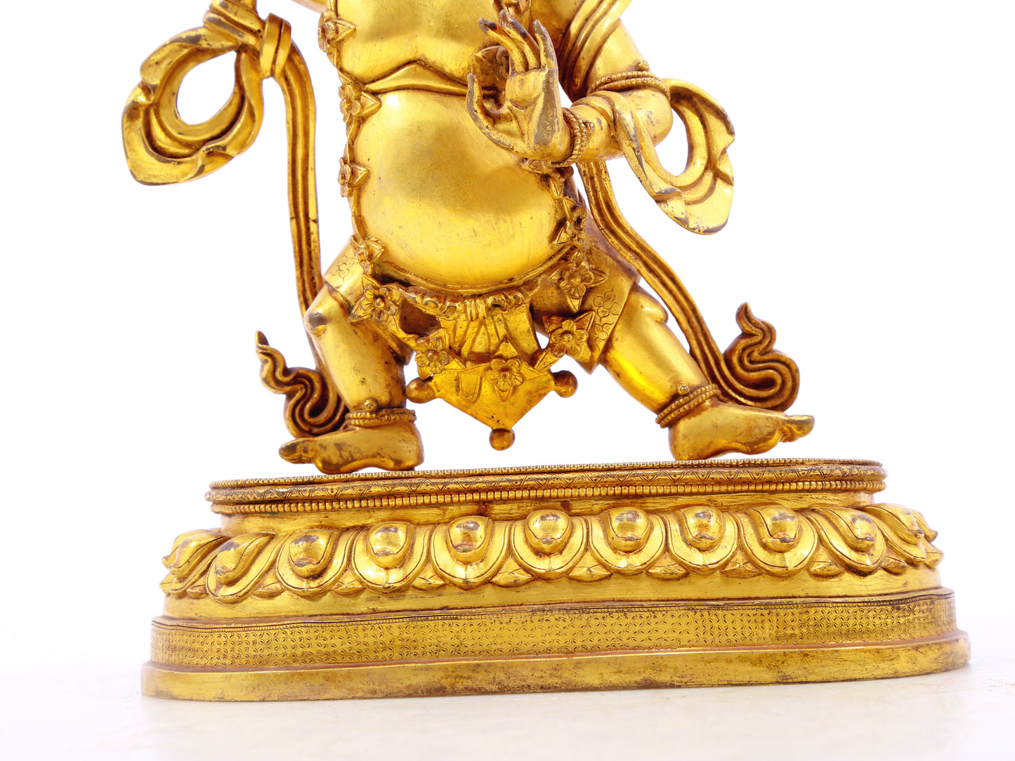 A serene gilt bronze Vajra statue