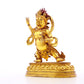 A serene gilt bronze Vajra statue