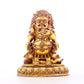 A serene gilt bronze statue of the God of Wealth