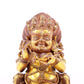 A serene gilt bronze statue of the God of Wealth