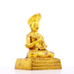 A serene gilt bronze statue of the guru