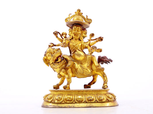 A serene gilt bronze statue of the patron saint