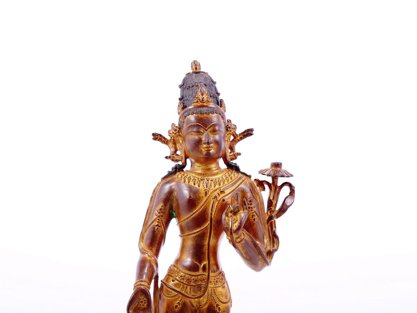 A serene gilt bronze statue of Tara