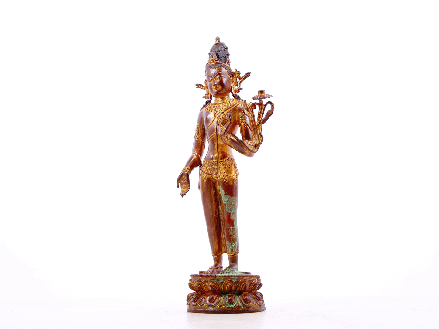 A serene gilt bronze statue of Tara