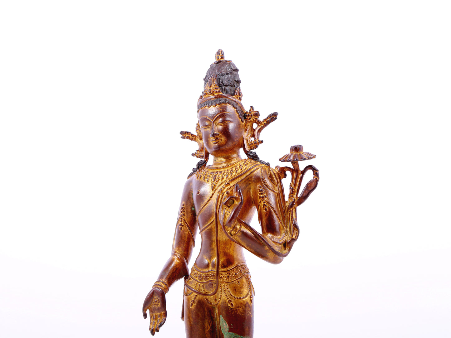 A serene gilt bronze statue of Tara