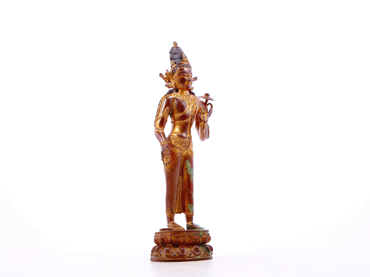 A serene gilt bronze statue of Tara