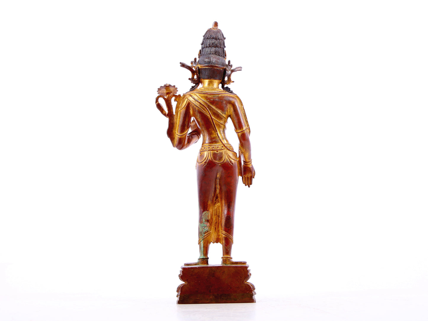 A serene gilt bronze statue of Tara