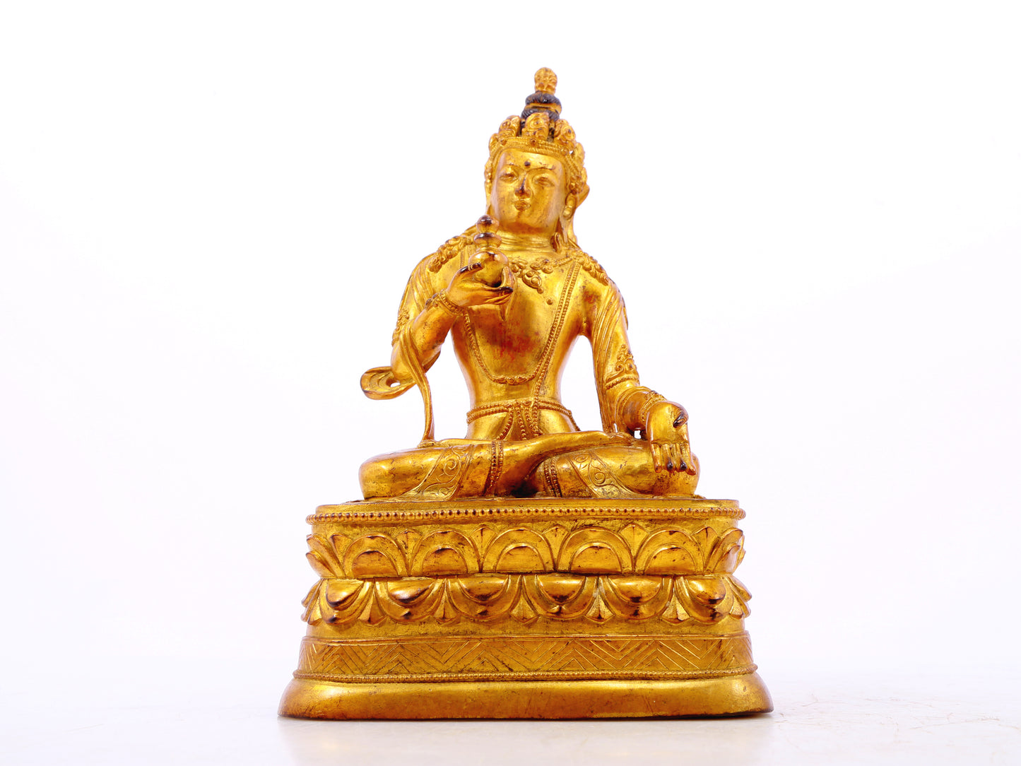 A serene gilt bronze statue of Bodhisattva