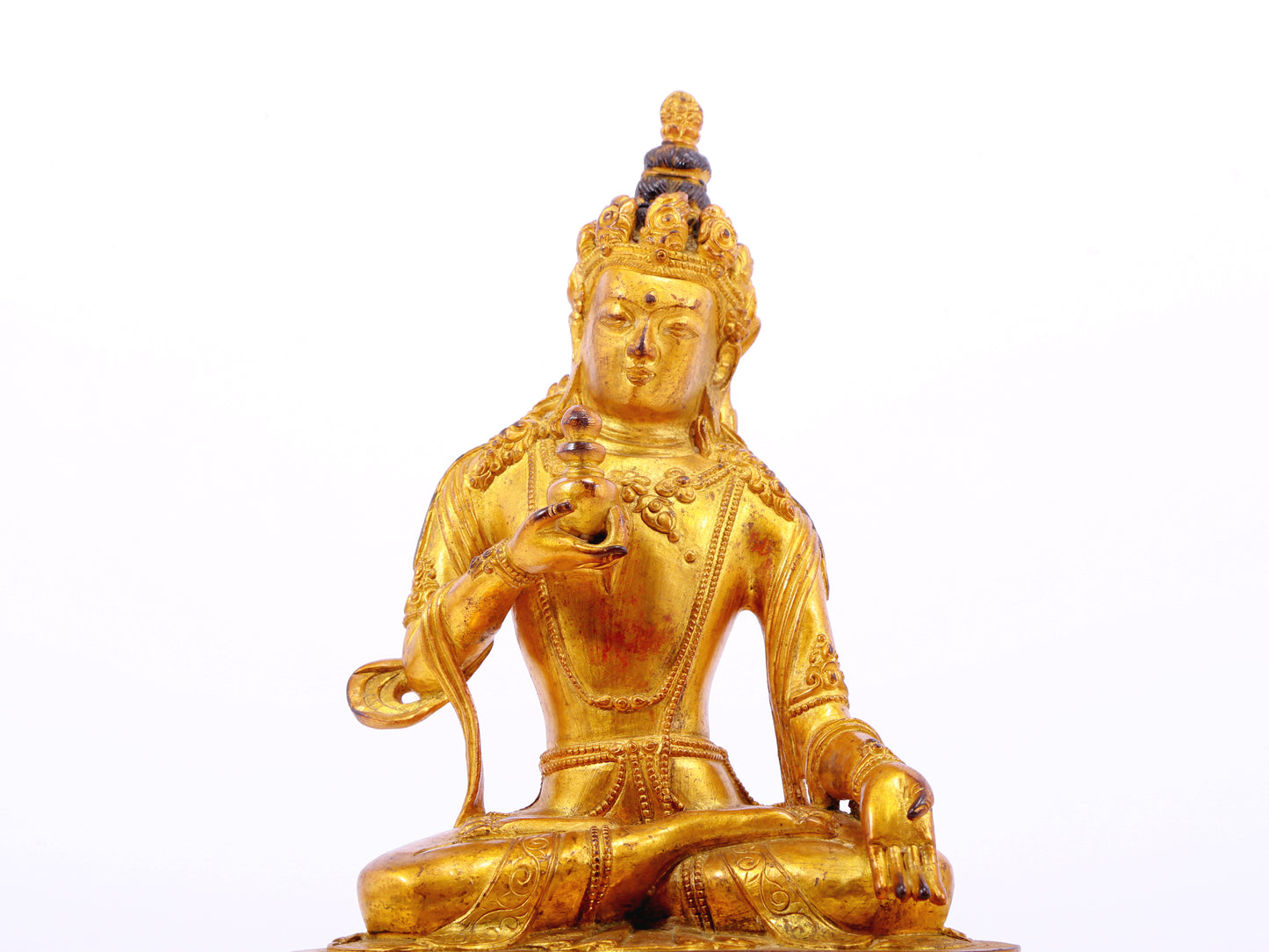 A serene gilt bronze statue of Bodhisattva