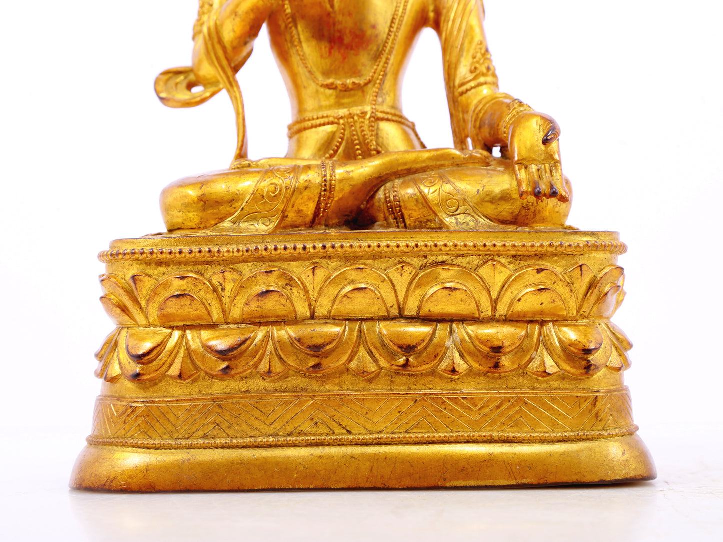 A serene gilt bronze statue of Bodhisattva