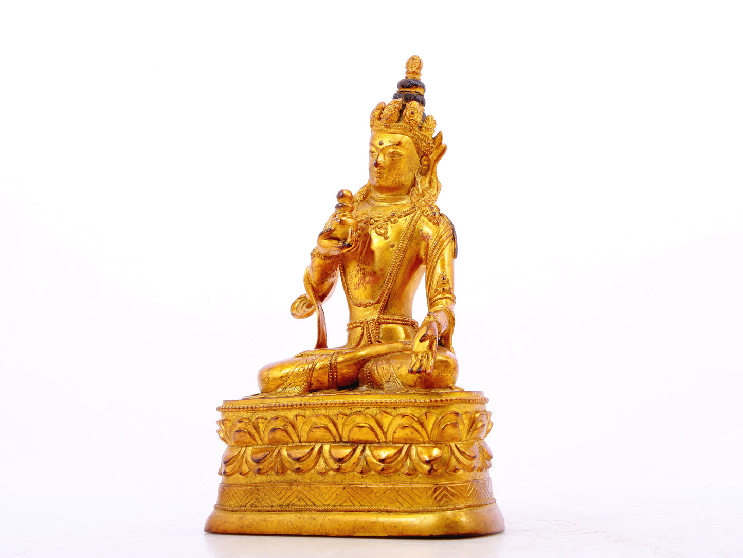 A serene gilt bronze statue of Bodhisattva