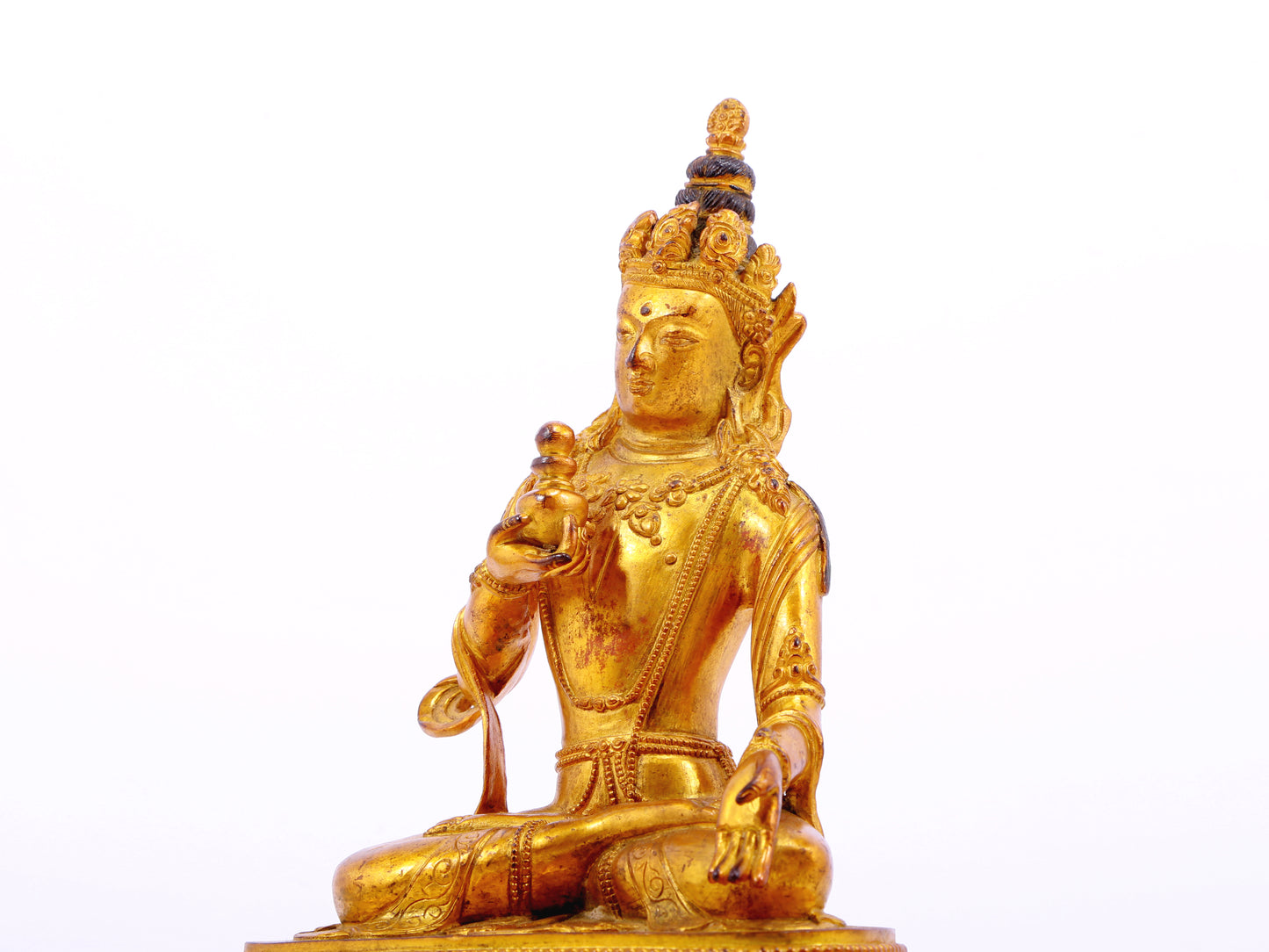 A serene gilt bronze statue of Bodhisattva