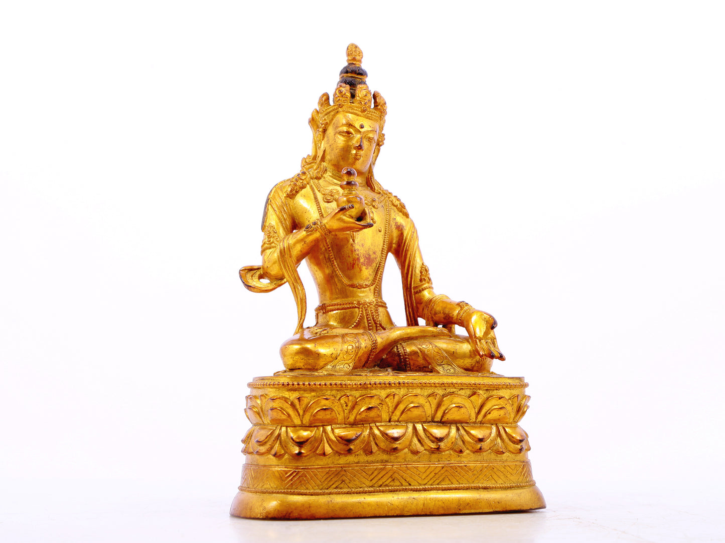 A serene gilt bronze statue of Bodhisattva