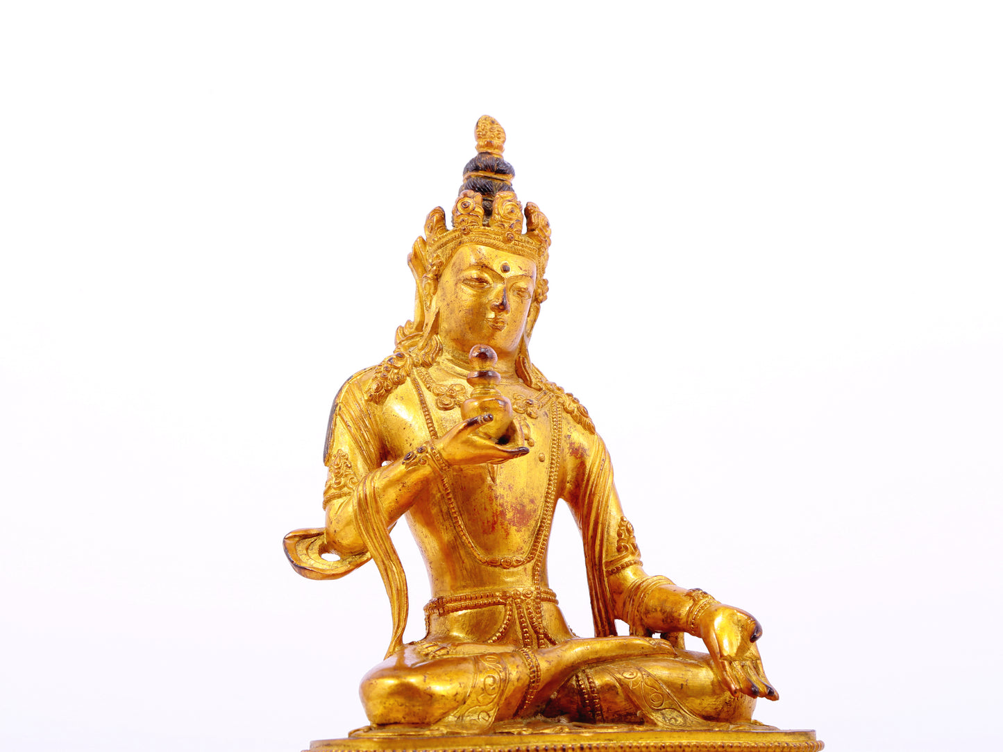 A serene gilt bronze statue of Bodhisattva