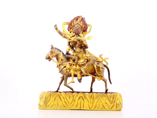 A serene gilt bronze equestrian statue of the God of Wealth