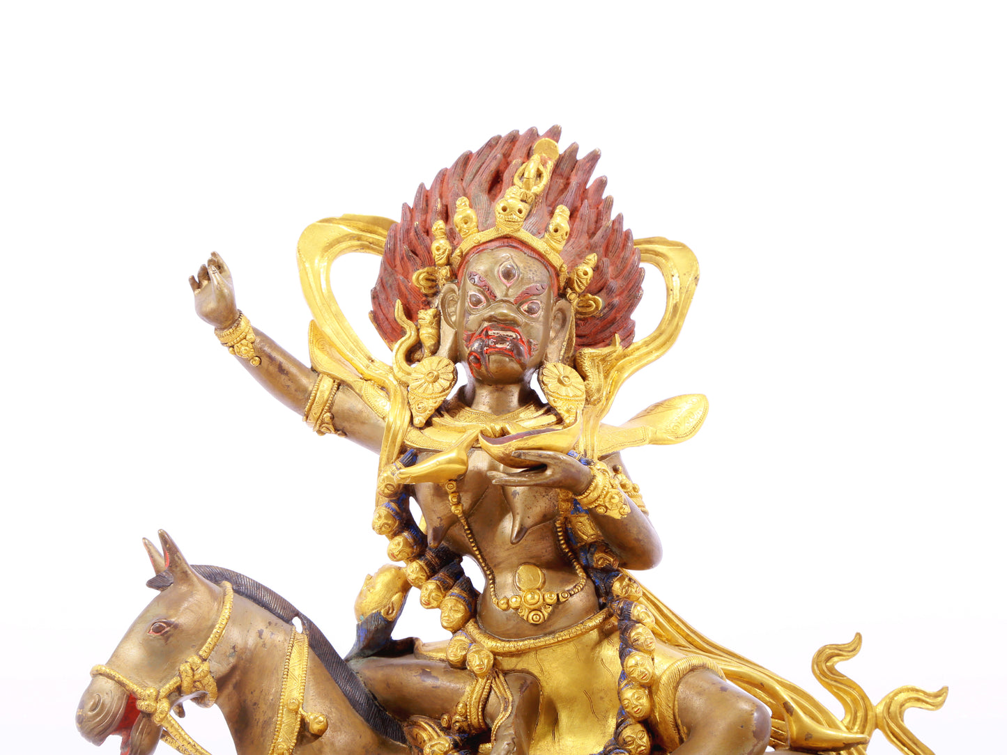 A serene gilt bronze equestrian statue of the God of Wealth