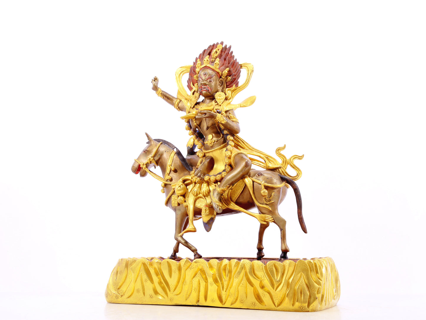 A serene gilt bronze equestrian statue of the God of Wealth