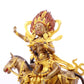 A serene gilt bronze equestrian statue of the God of Wealth