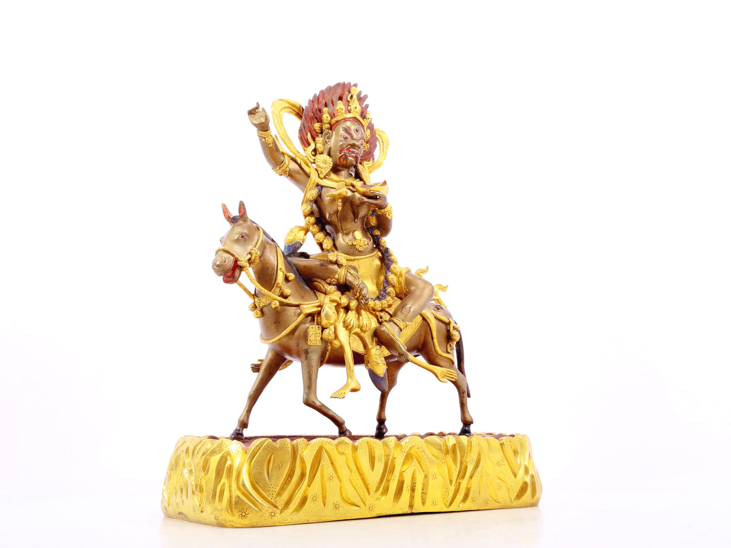 A serene gilt bronze equestrian statue of the God of Wealth