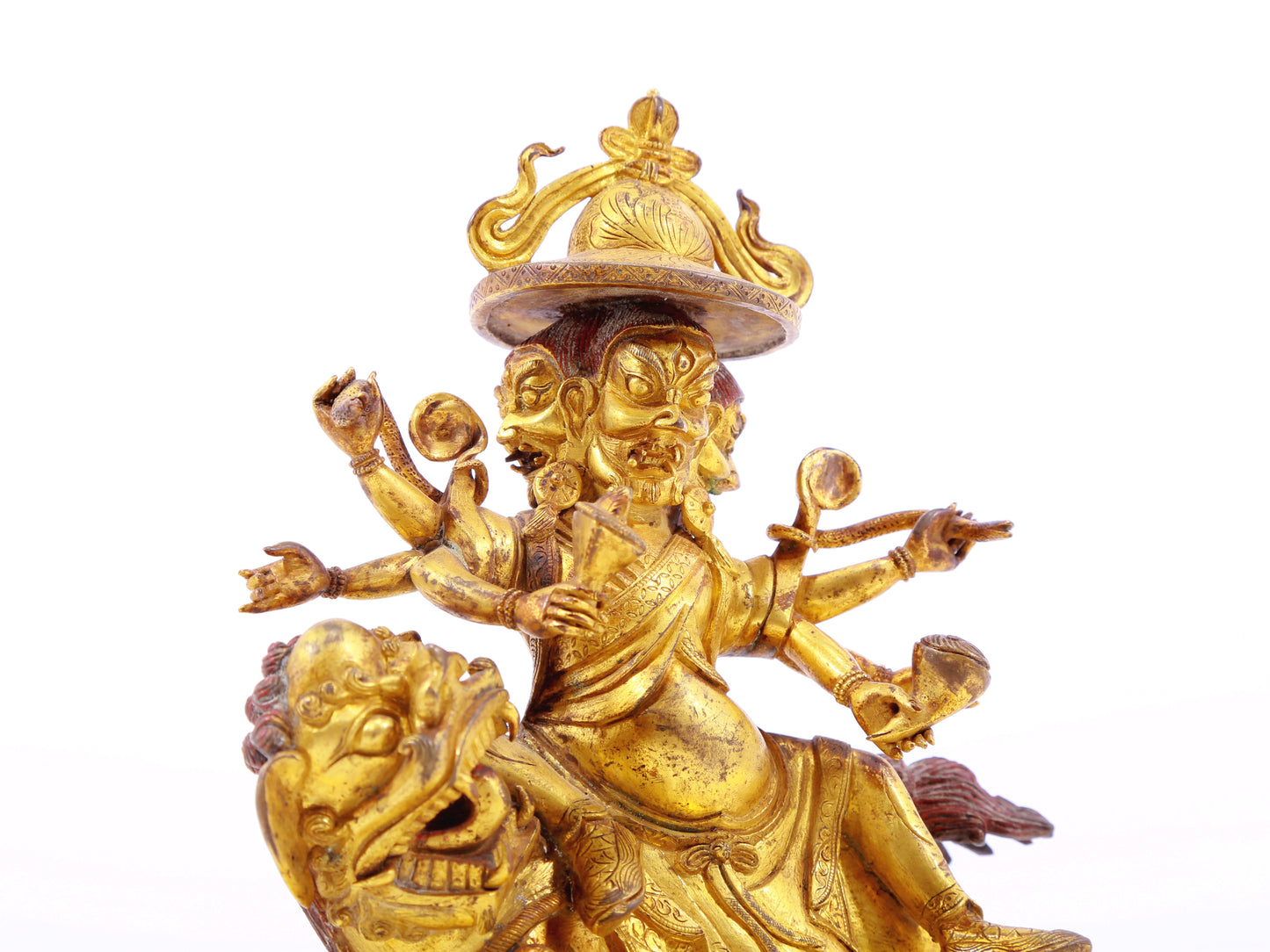 A serene gilt bronze statue of the patron saint