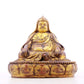 A serene gilt bronze statue of Tsongkhapa