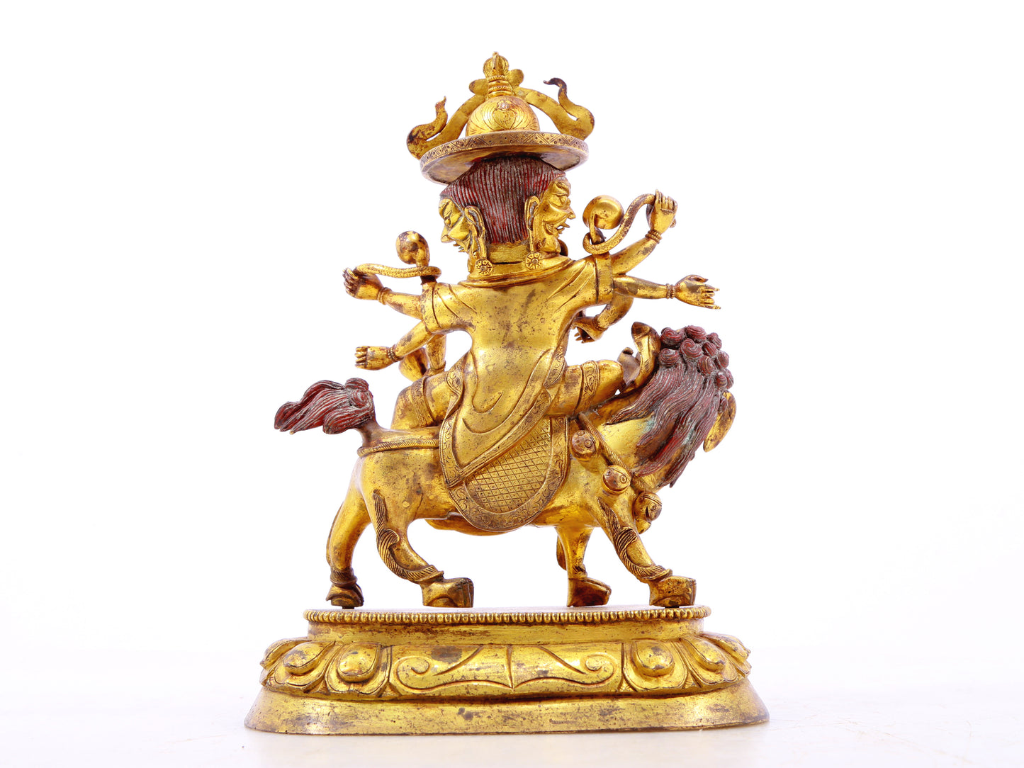 A serene gilt bronze statue of the patron saint