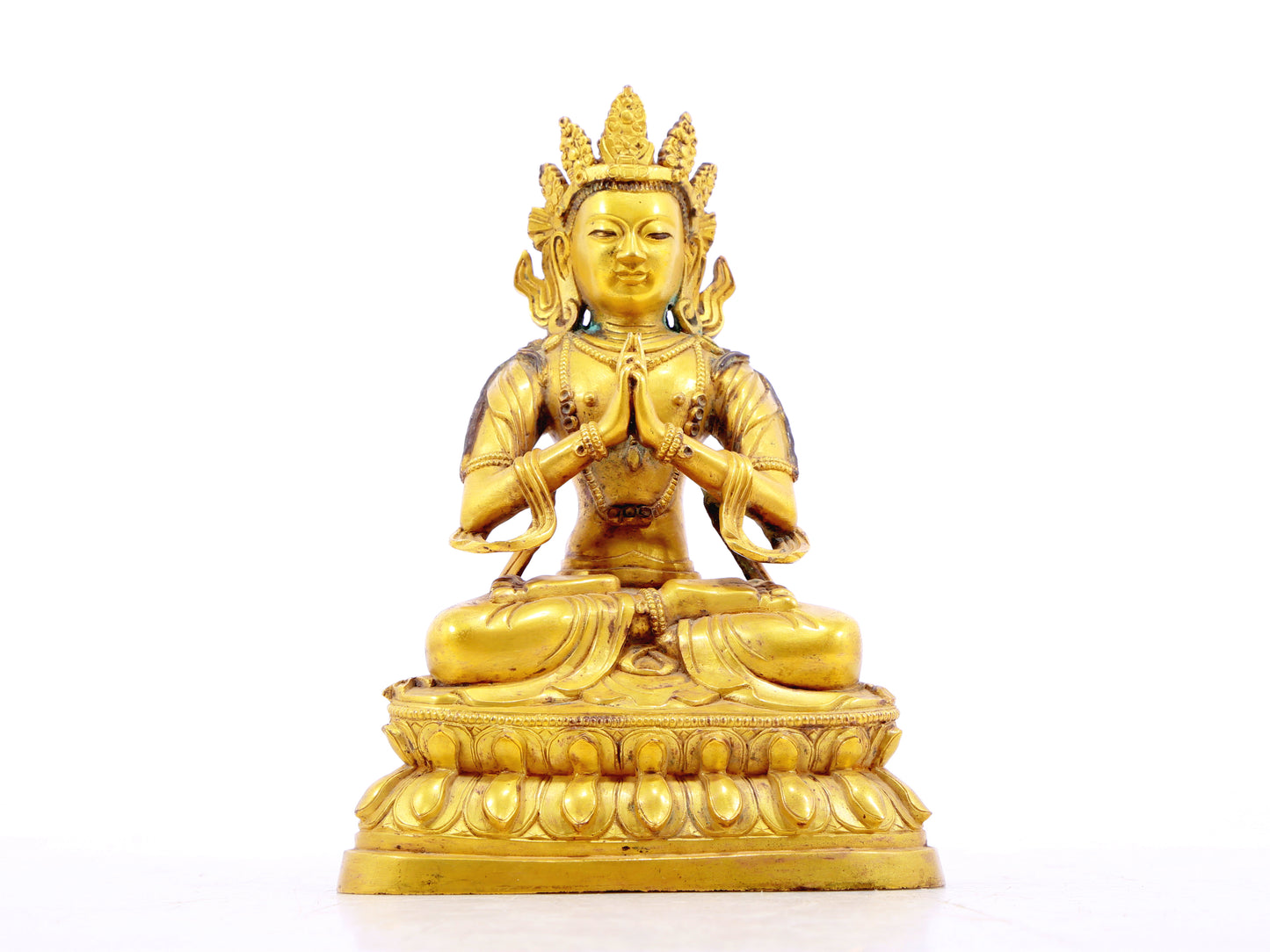 A serene gilt bronze statue of Bodhisattva