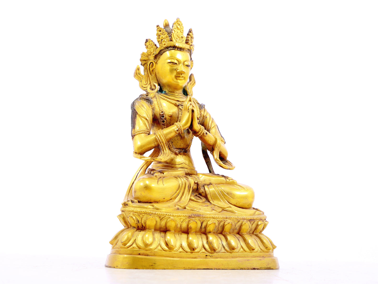 A serene gilt bronze statue of Bodhisattva