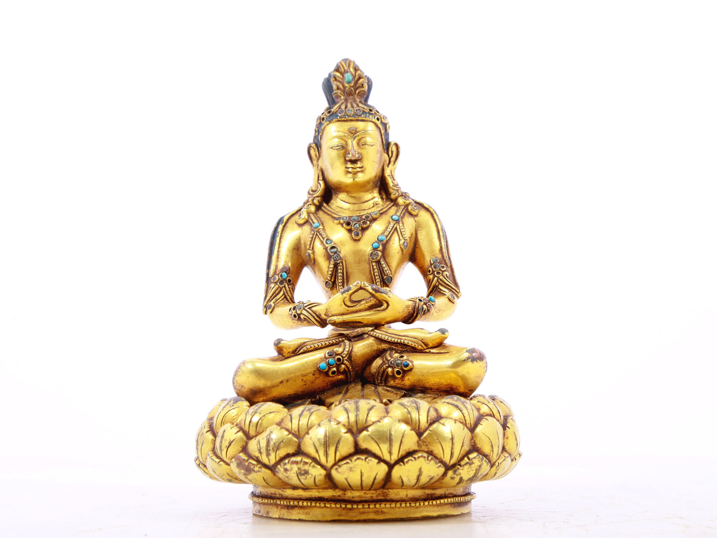 A serene gilt bronze statue of Bodhisattva inlaid with turquoise