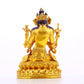 A serene gilt bronze statue of Manjushri Bodhisattva