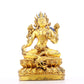 A serene gilt bronze statue of green Tara