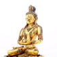 A serene gilt bronze statue of Bodhisattva inlaid with turquoise