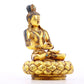 A serene gilt bronze statue of Bodhisattva inlaid with turquoise