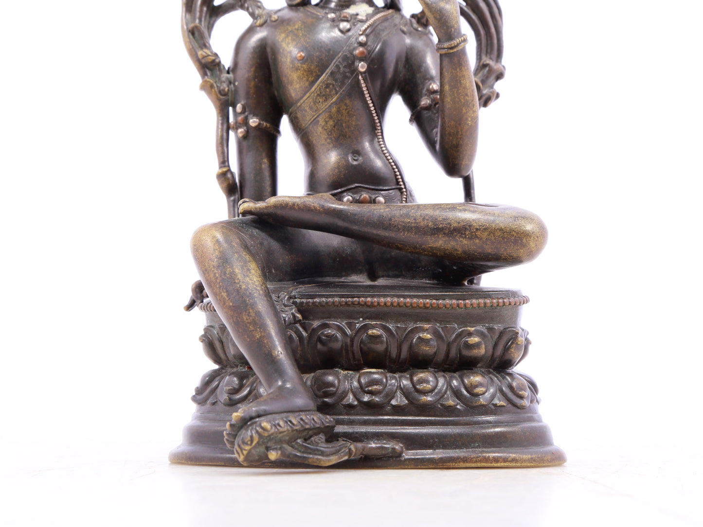 A serene alloy bronze inlaid silver-green Tara statue