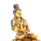 A serene gilt bronze statue of Bodhisattva inlaid with turquoise