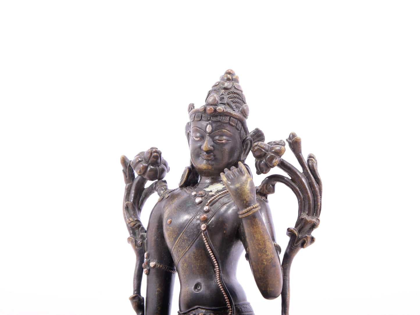 A serene alloy bronze inlaid silver-green Tara statue