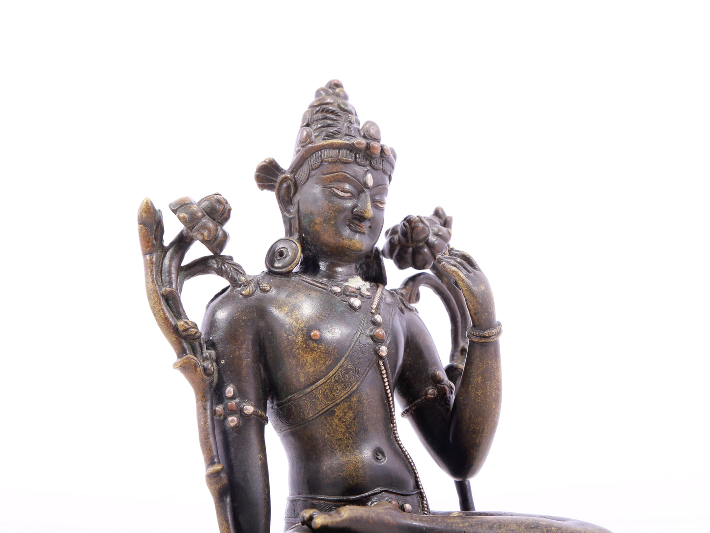 A serene alloy bronze inlaid silver-green Tara statue