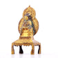 A serene gilt bronze statue of Gautama Buddha