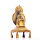 A serene gilt bronze statue of Gautama Buddha