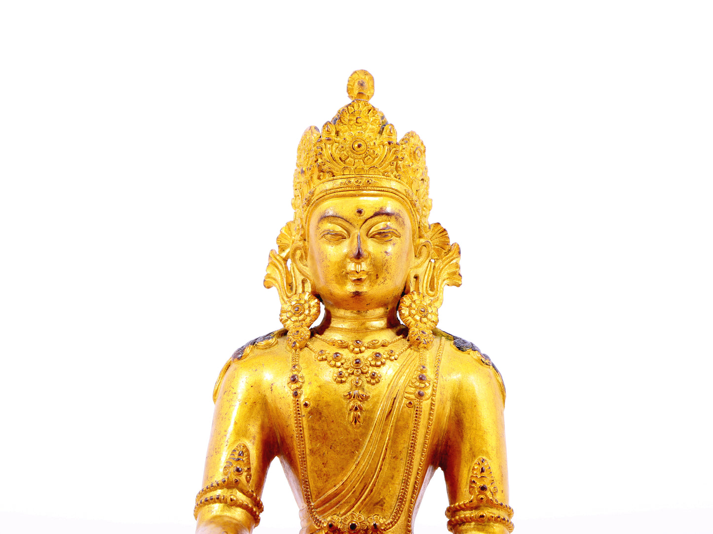 A serene gilt bronze statue of Bodhisattva