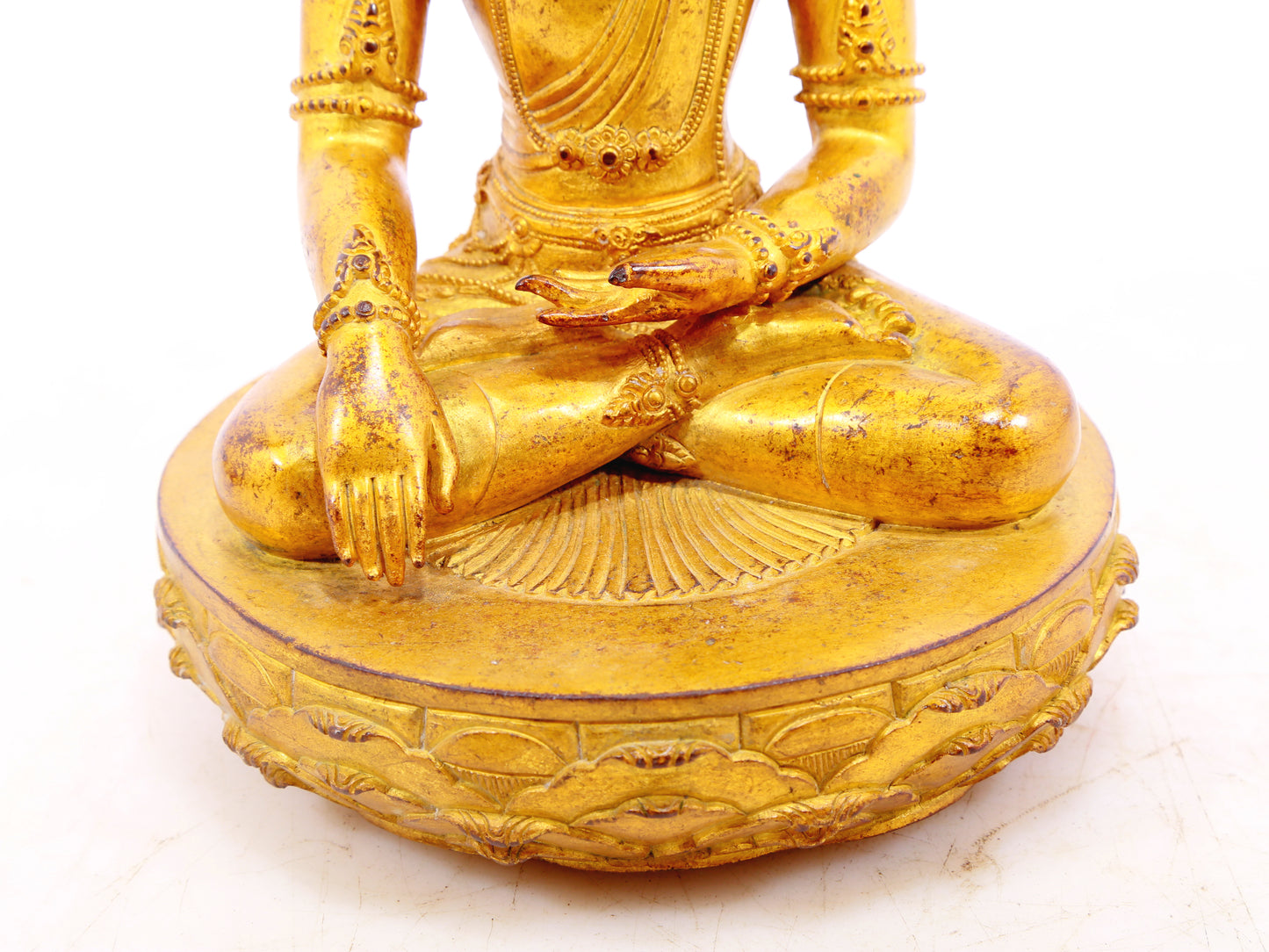 A serene gilt bronze statue of Bodhisattva