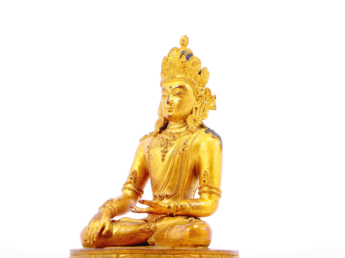 A serene gilt bronze statue of Bodhisattva