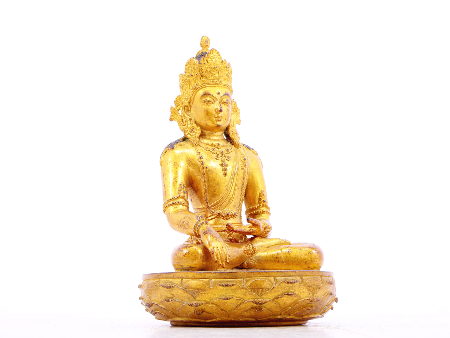 A serene gilt bronze statue of Bodhisattva