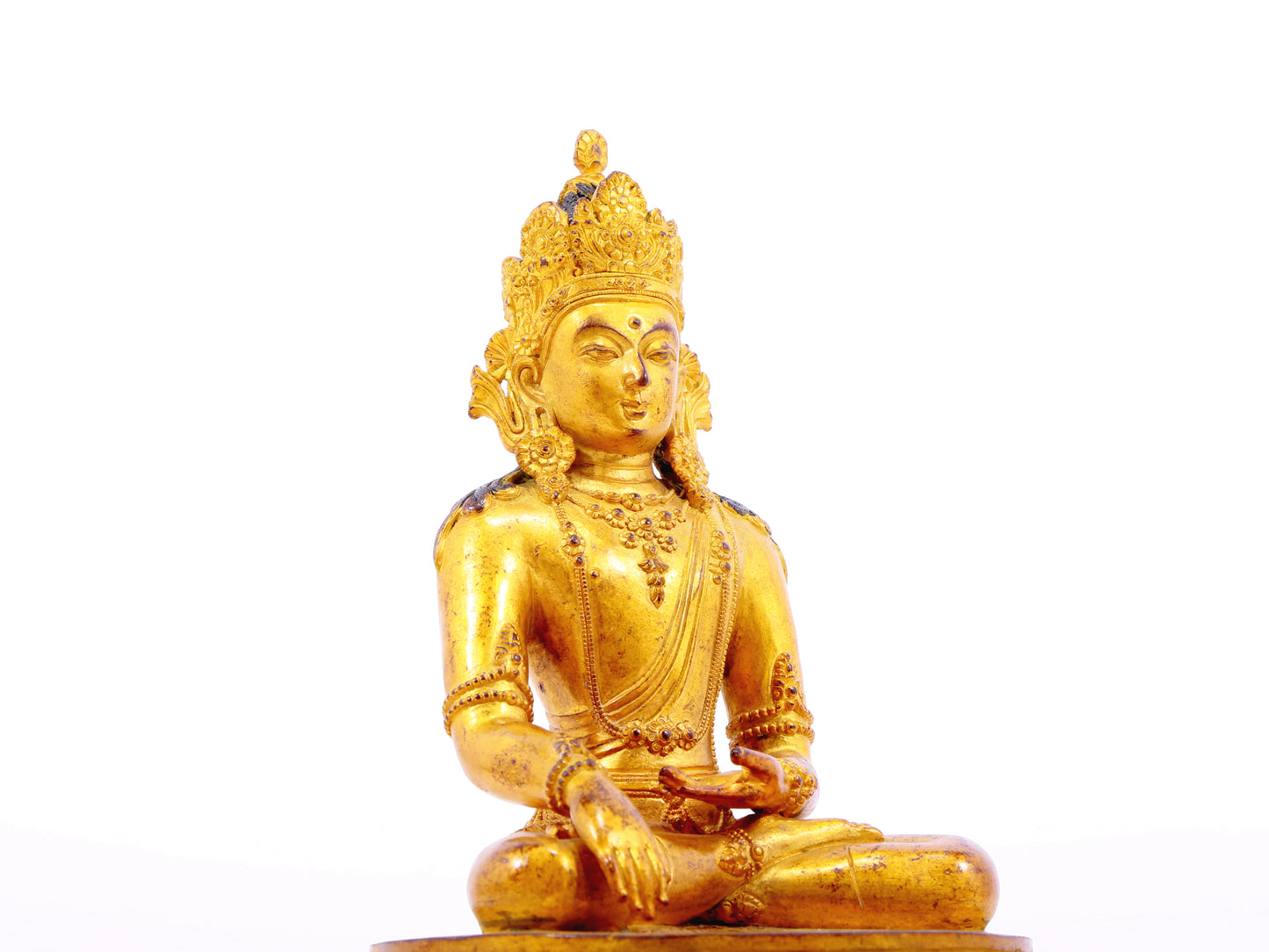 A serene gilt bronze statue of Bodhisattva